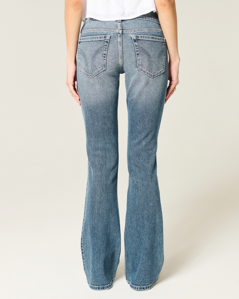 jeans bootcut a vita bassa effetto consumato lavaggio medio