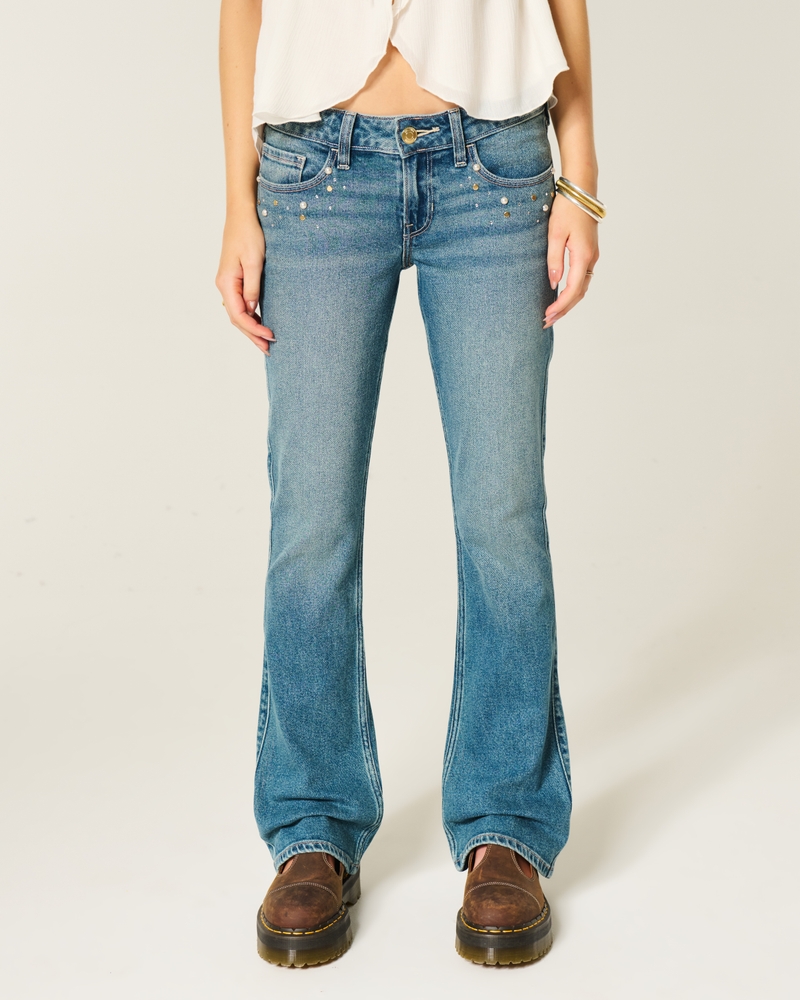 jeans bootcut a vita bassa effetto consumato lavaggio medio