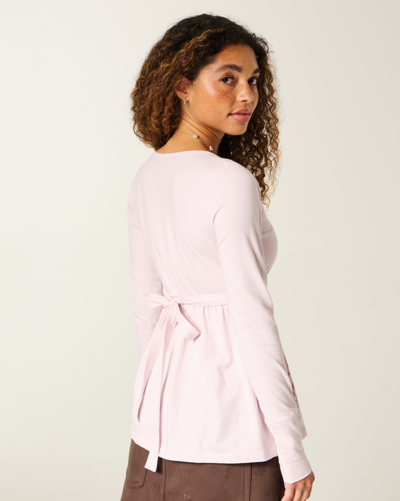 top babydoll con corpetto arricciato a maniche lunghe e motivo sul petto