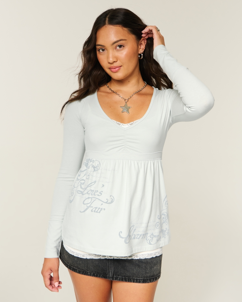 top babydoll con corpetto arricciato a maniche lunghe e motivo sul petto