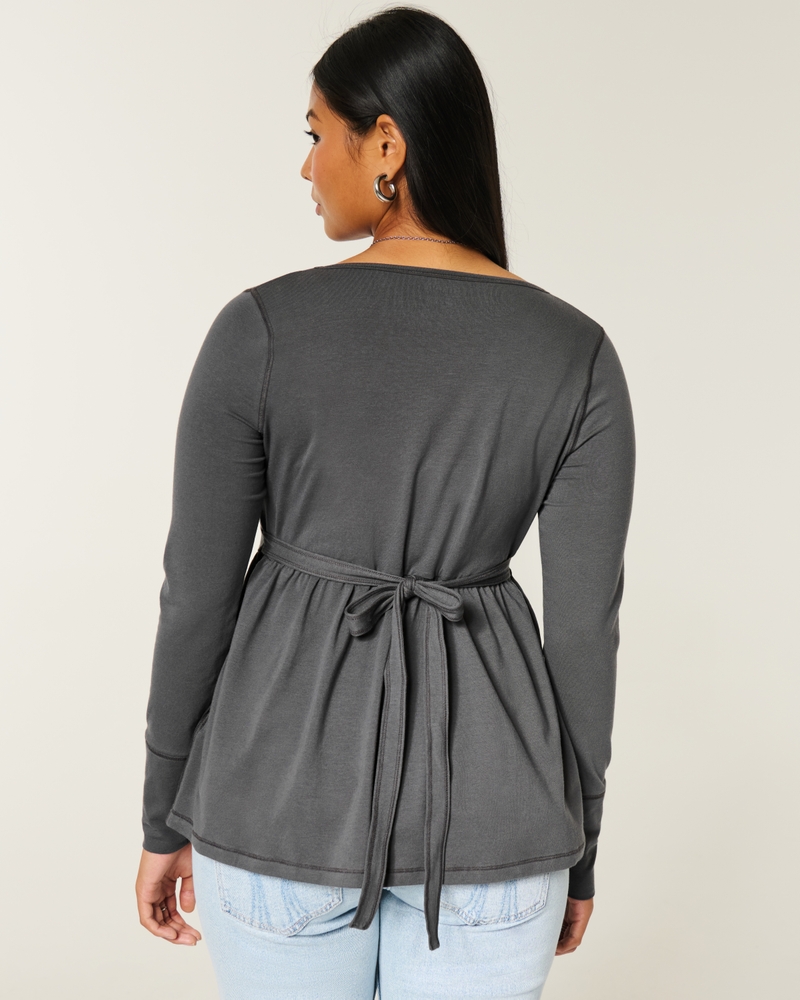 top babydoll con corpetto arricciato a maniche lunghe e motivo sul petto