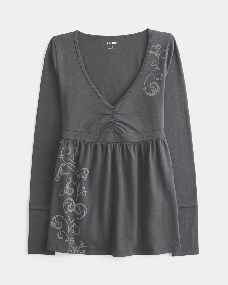 top babydoll con corpetto arricciato a maniche lunghe e motivo sul petto
