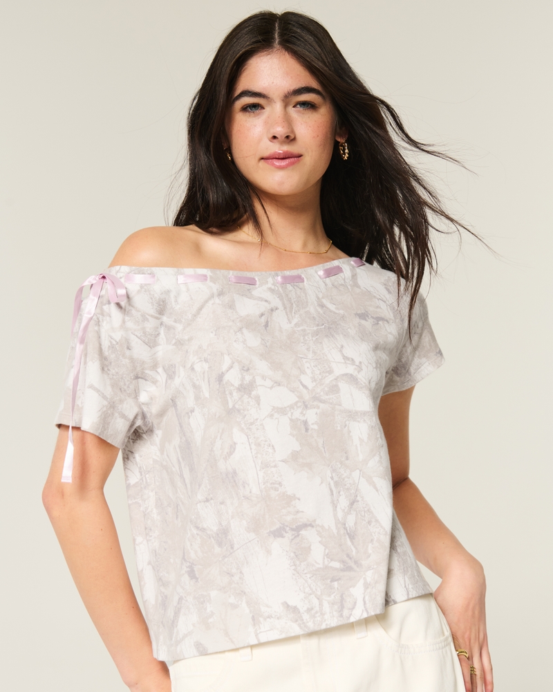t-shirt ampia con spalle scoperte e nodo sul davanti