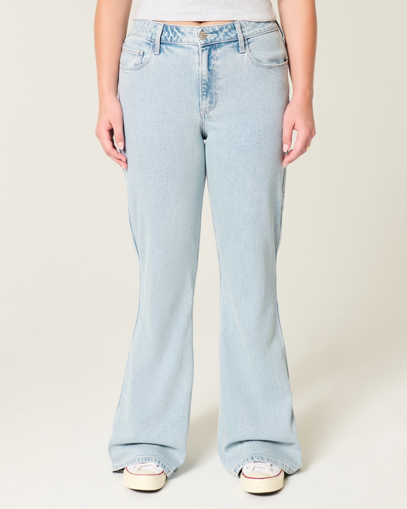 jeans svasati a vita alta lavaggio chiaro con ricamo a cuore