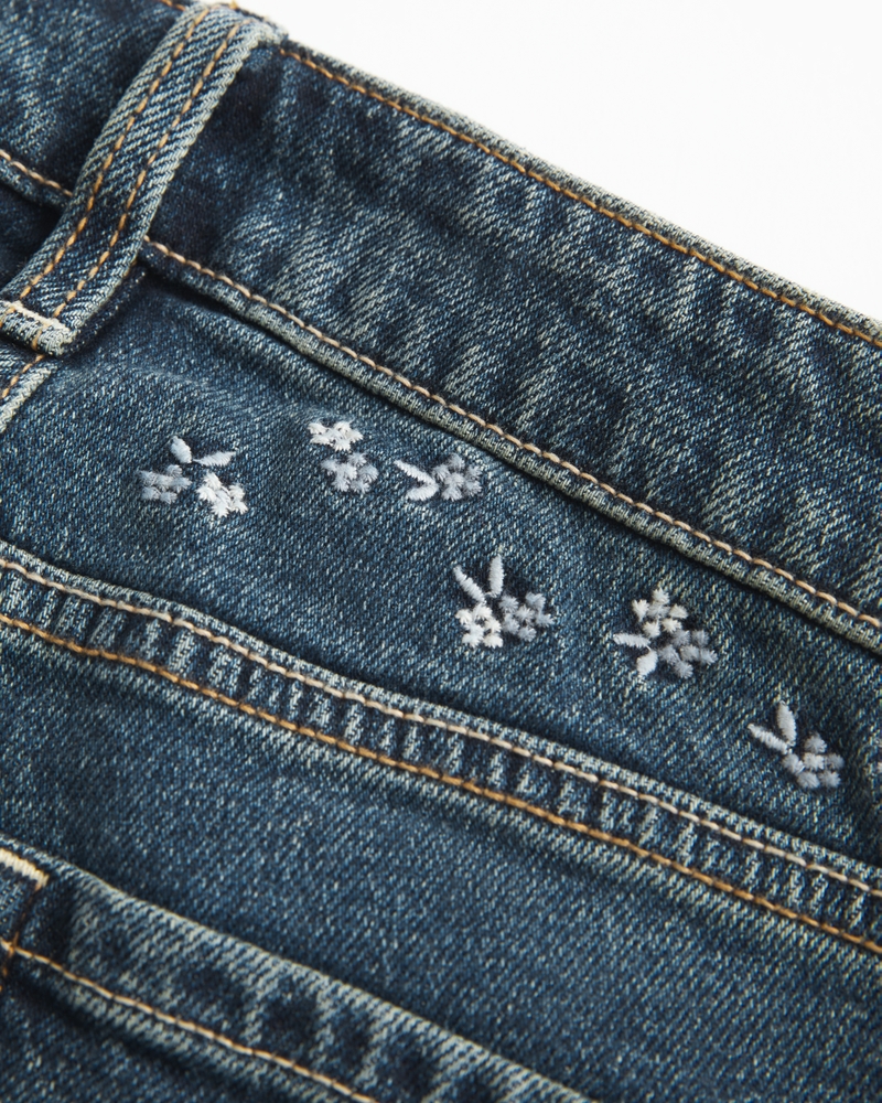 jeans svasati a vita alta neri lavati e ricamati
