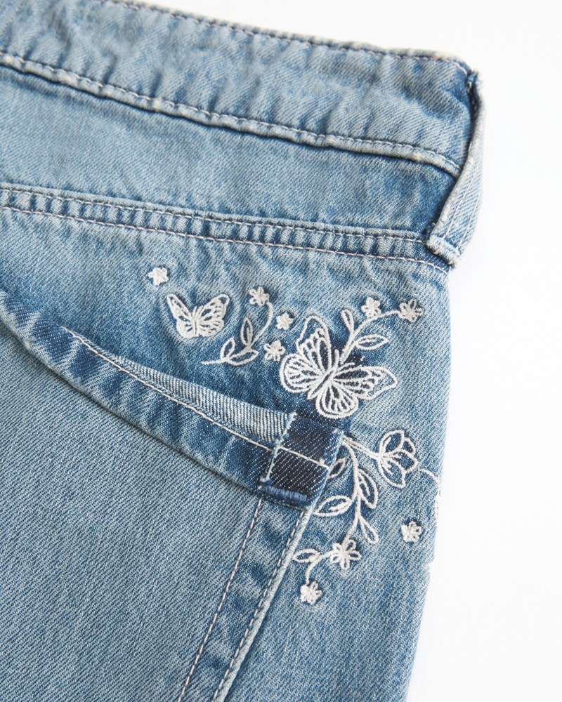 jeans larghi a vita bassa lavaggio medio patchwork fantasia