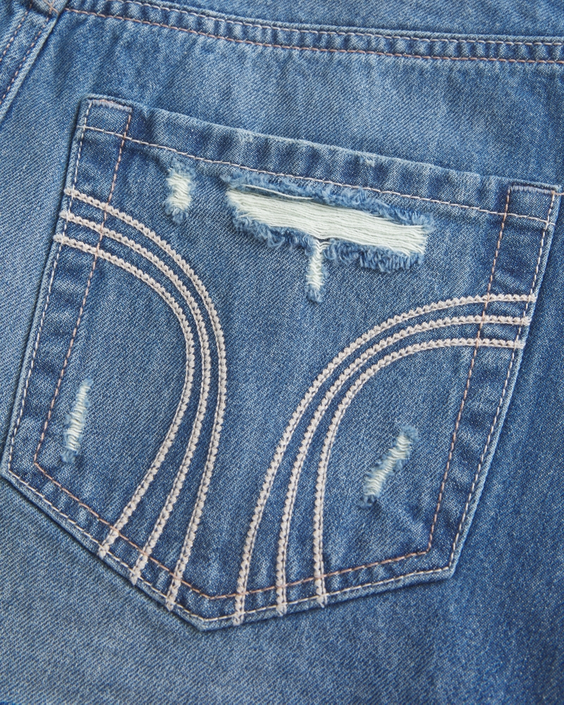 minigonnapantaloni in denim scuro strappato e lavato a vita bassa