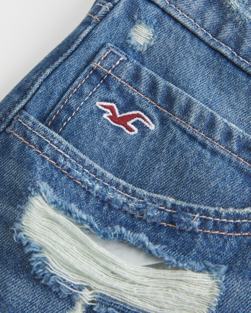 minigonnapantaloni in denim scuro strappato e lavato a vita bassa