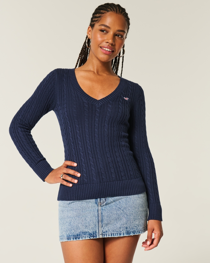 maglione con scollo a v e motivo a trecce
