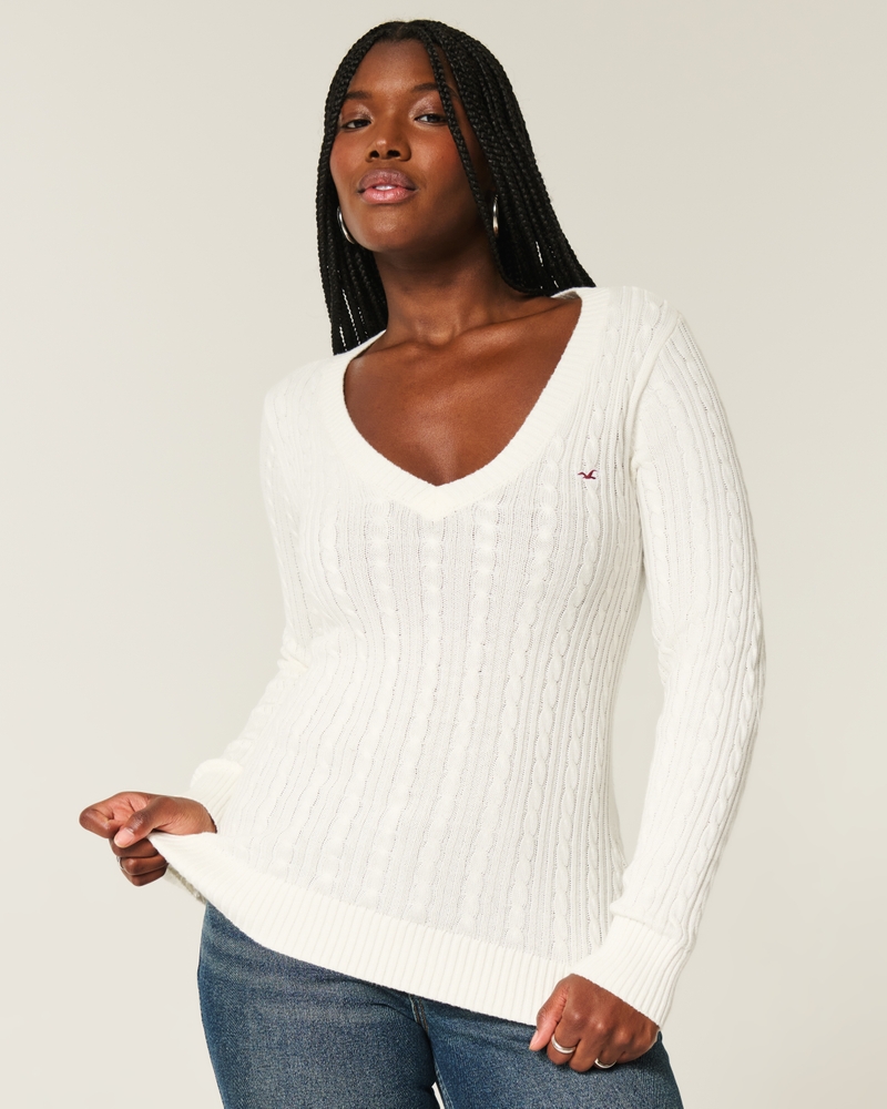 maglione con scollo a v e motivo a trecce