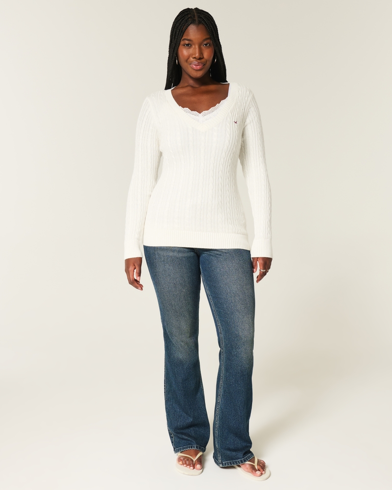 maglione con scollo a v e motivo a trecce