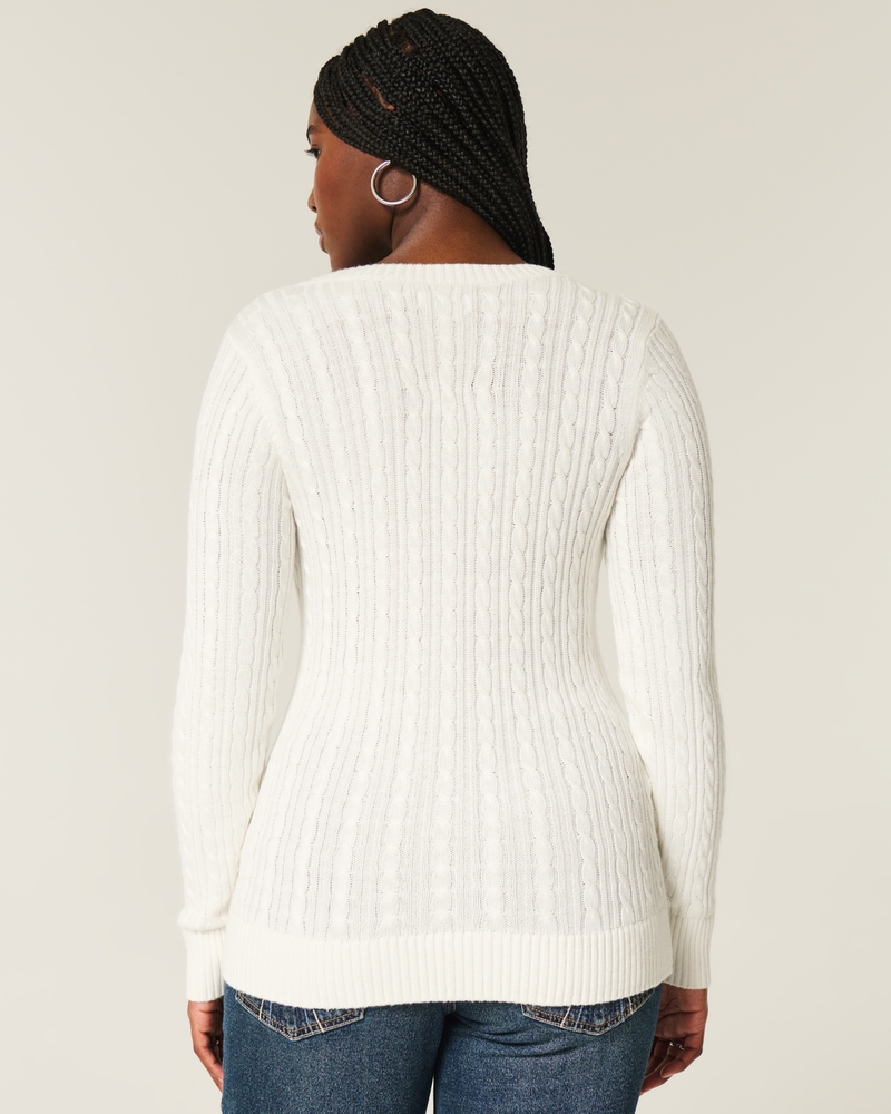 maglione con scollo a v e motivo a trecce