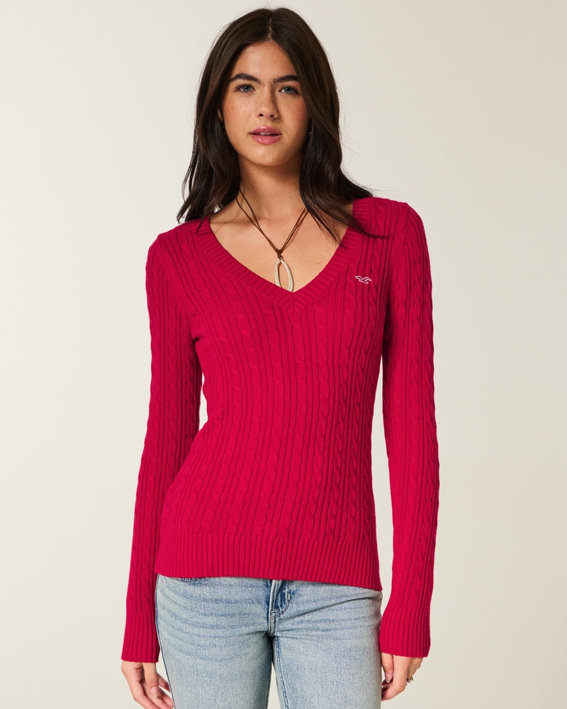 maglione con scollo a v e motivo a trecce