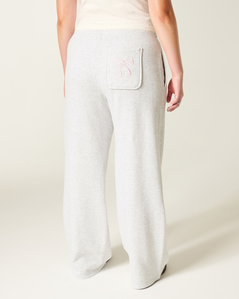 pantaloni della tuta a gamba larga con tasca a forma di cuore