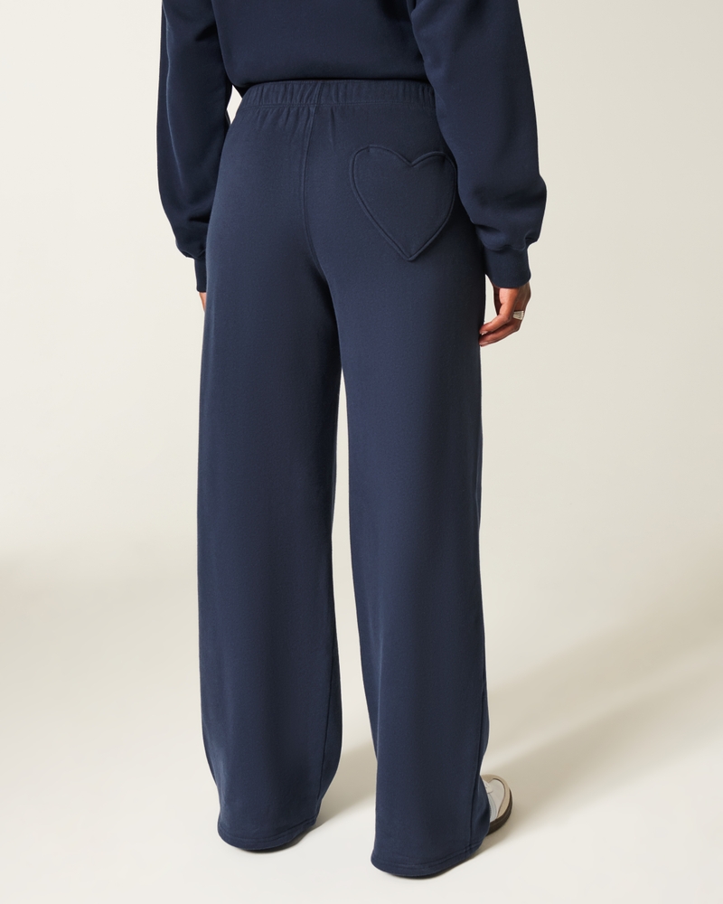 pantaloni della tuta a gamba larga con tasca a forma di cuore