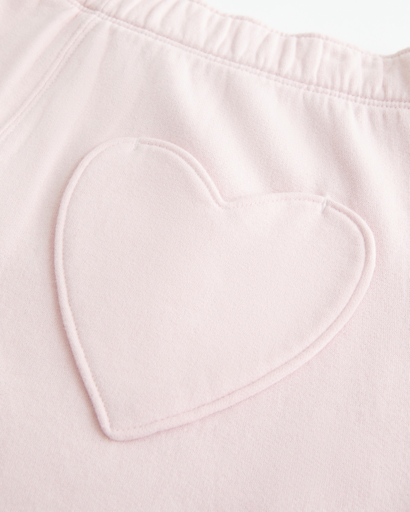 pantaloni della tuta a gamba larga con tasca a forma di cuore