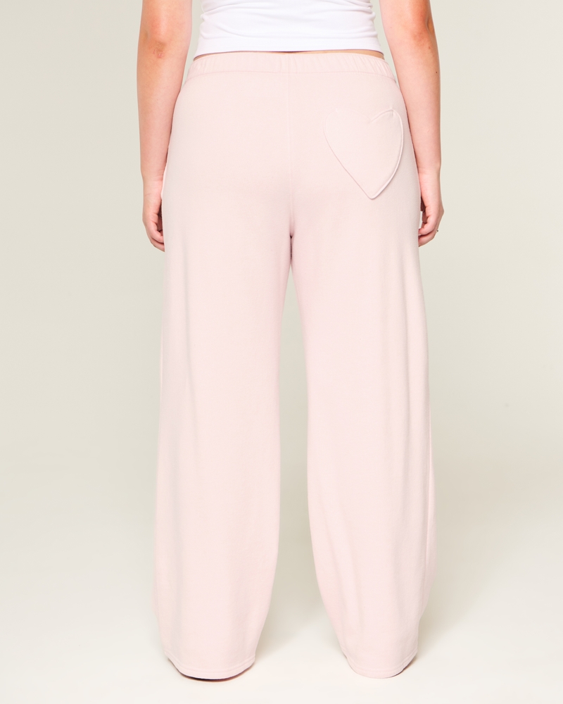 pantaloni della tuta a gamba larga con tasca a forma di cuore