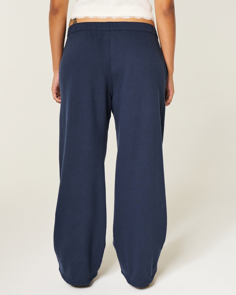 pantaloni della tuta mimetici rosa a gamba larga con motivo del logo