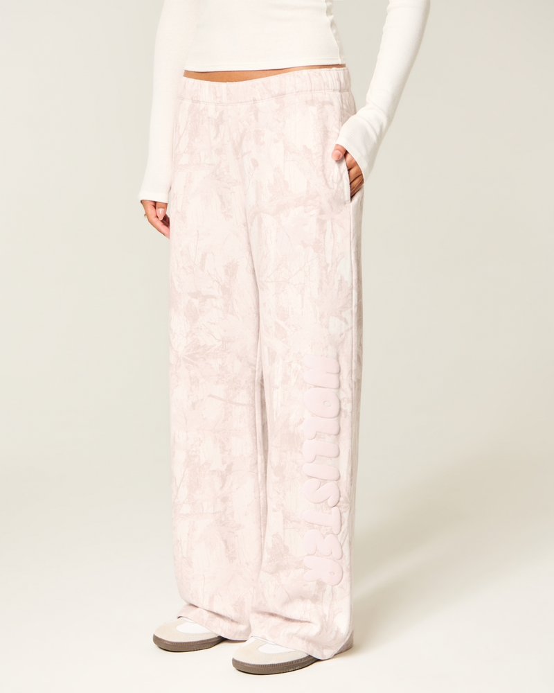 pantaloni della tuta mimetici rosa a gamba larga con motivo del logo