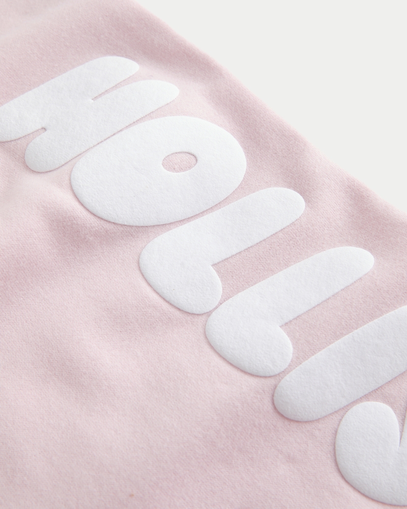 pantaloni della tuta mimetici rosa a gamba larga con motivo del logo