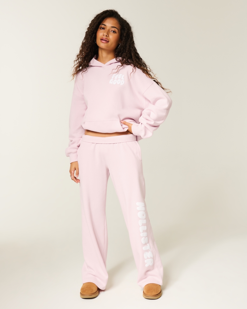 pantaloni della tuta mimetici rosa a gamba larga con motivo del logo