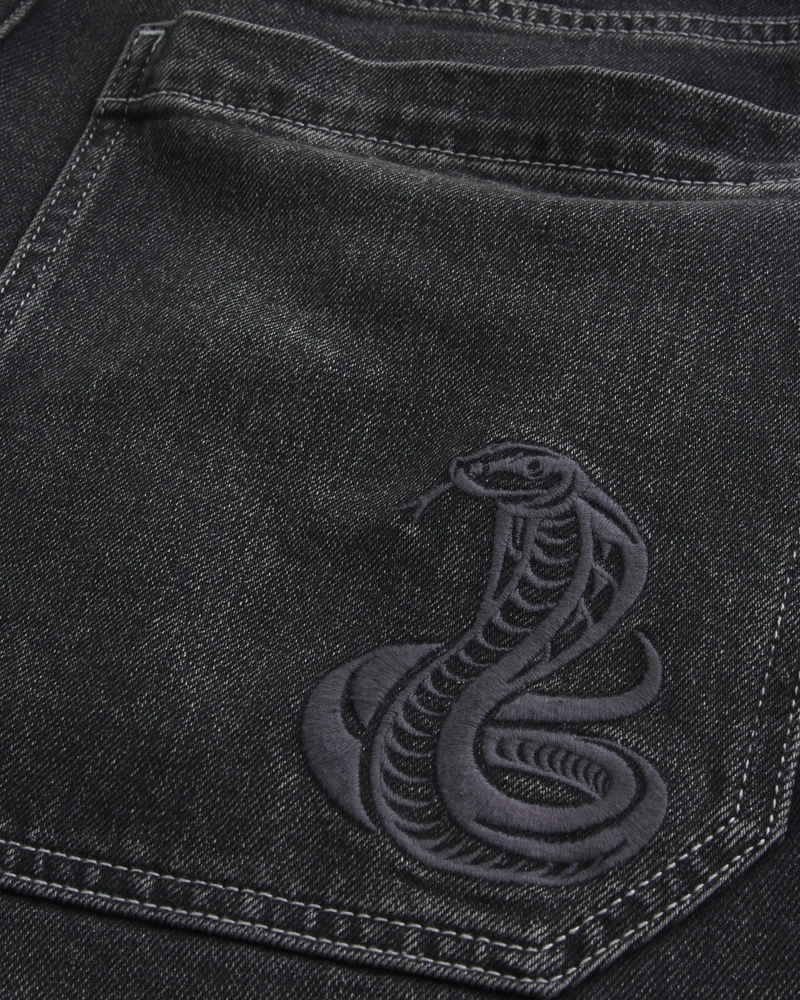 jeans sformati in stile skateboard con motivo a clown da poker nero lavato