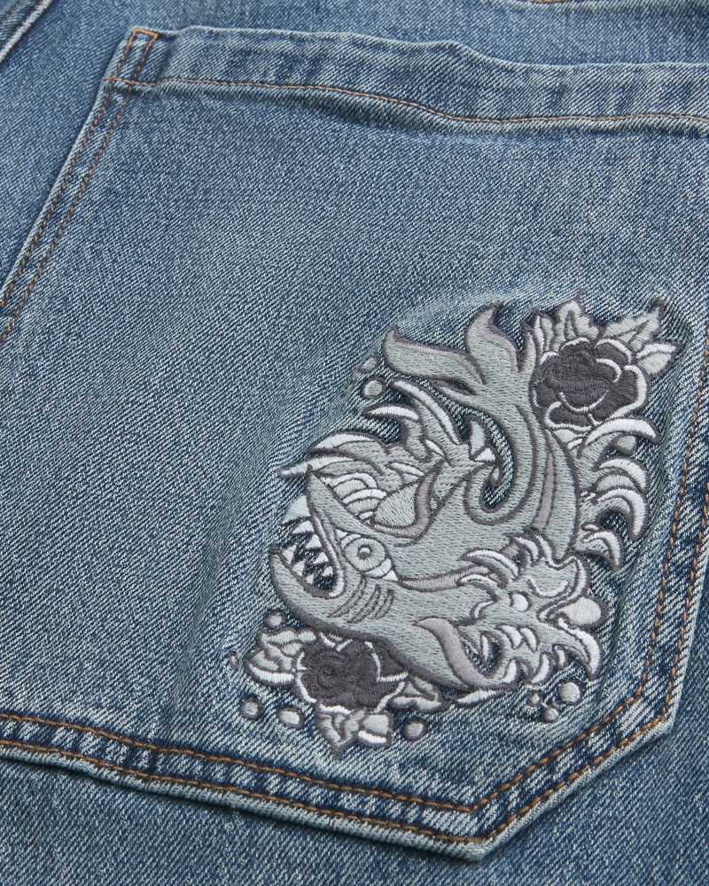 jeans sformati in stile skateboard con motivo a clown da poker nero lavato