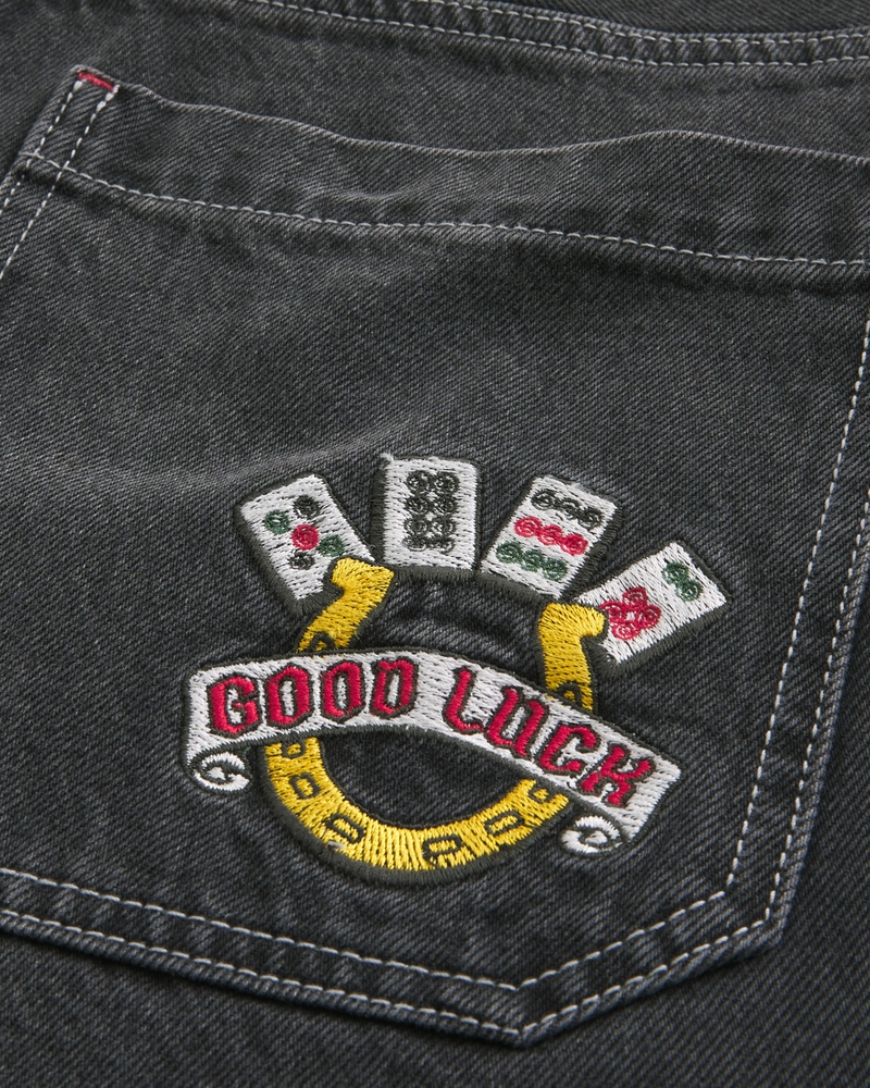 jeans sformati in stile skateboard con motivo a clown da poker nero lavato