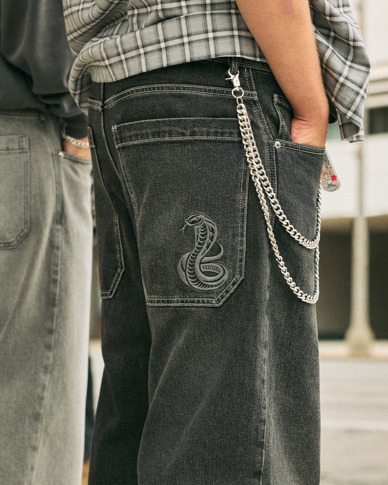 jeans sformati in stile skateboard con motivo a clown da poker nero lavato