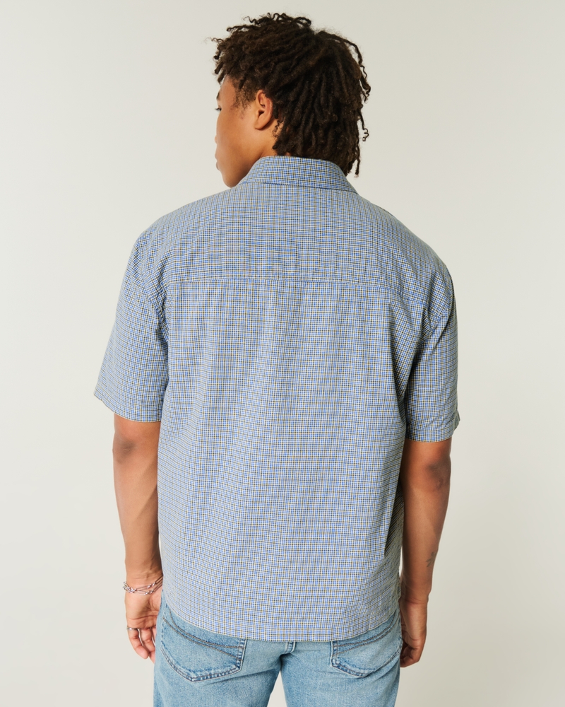 camicia a maniche corte dal taglio quadrato con motivo a carte da gioco